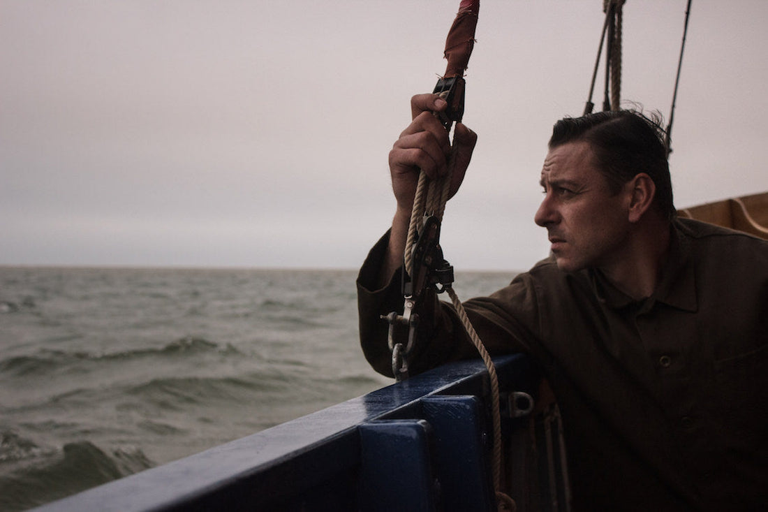 Man on a boat wearing British Aftershave