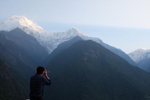 Man taking photo of scenic view